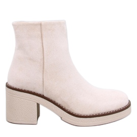 Stivaletti Eliza in camoscio beige con tacco largo