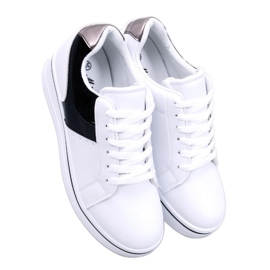 Scarpe da ginnastica nere con zeppa bianca