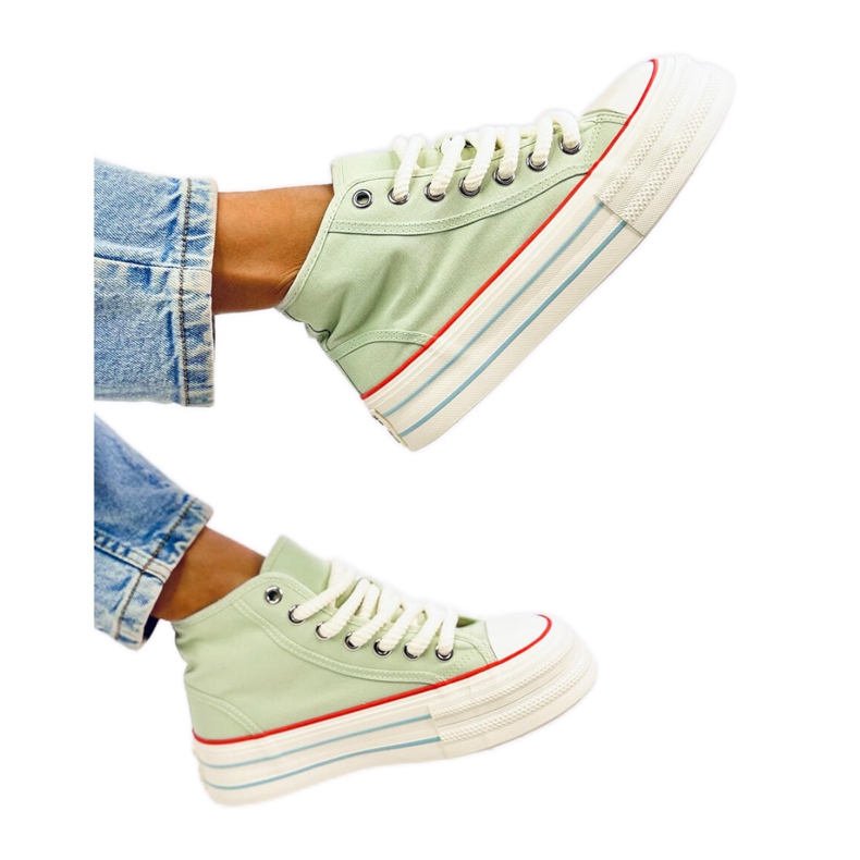 Sneakers alte da donna sulla piattaforma verde
