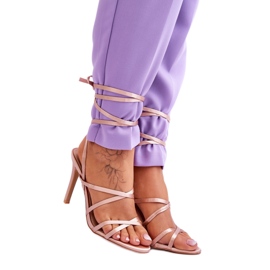 Sandali beige stringati con tacco alto