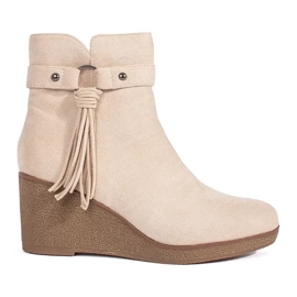 Stivali da donna con zeppa in camoscio beige chiaro con frange