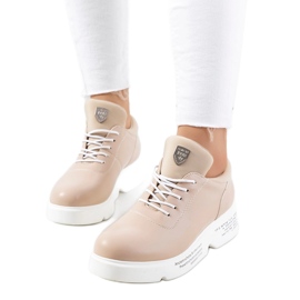 Sneakers sportive da donna beige sulla piattaforma
