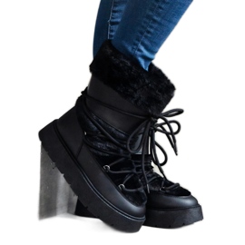 Doposci slip-on da donna isolati neri decorati con pelliccia nero