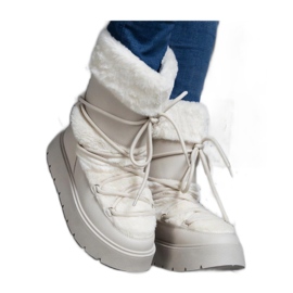 Stivali da neve stringati isolanti beige chiaro decorati con pelliccia di Istiss - Solea