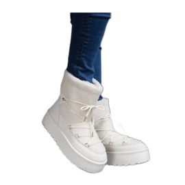 Doposci bianchi con plateau e pelliccia bianco