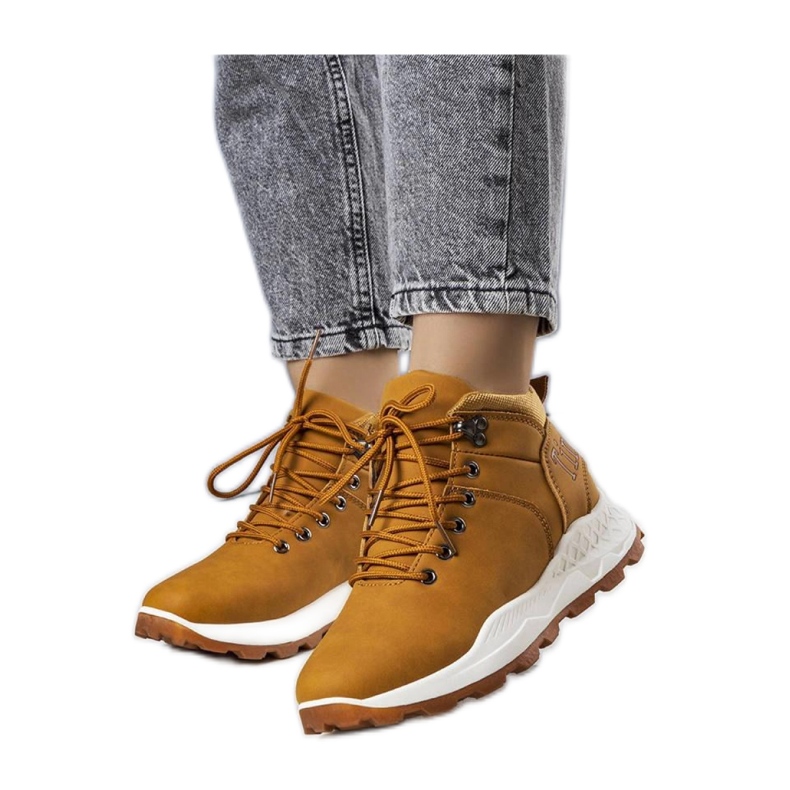 Scarponi da trekking da donna marroni e isolanti marrone