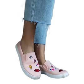 Sneakers in tessuto rosa con toppe