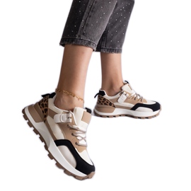 Sneaker beige decorate con un motivo animale