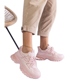 Sneaker sportive rosa con suola massiccia