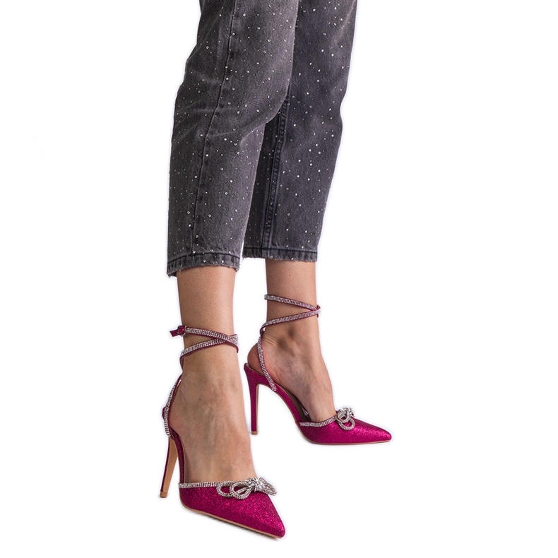 Decolleté rosa glitter con fiocco e strass