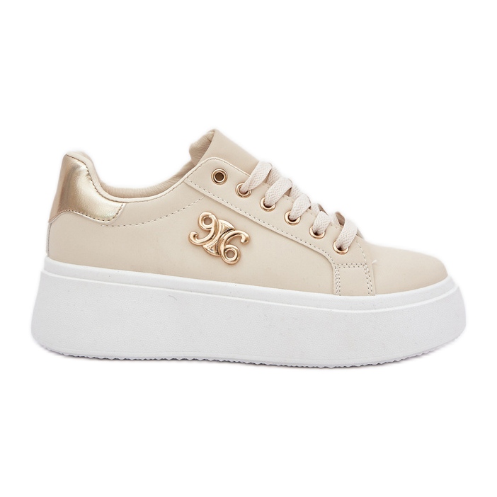 Sneaker femminili sulla piattaforma beige e oro