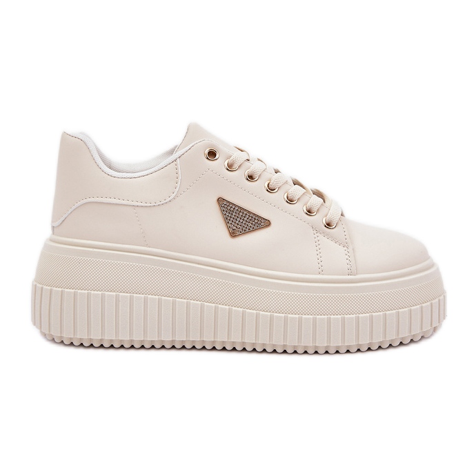 Sneaker eleganti su un'enorme piattaforma beige leggera