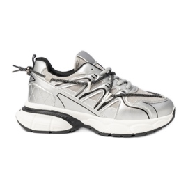 Sneaker d'argento femminile sulla piattaforma