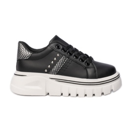 Sneaker femminili sulla piattaforma nera con strass nero