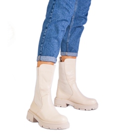 Stivali beige con un inserto per materiale