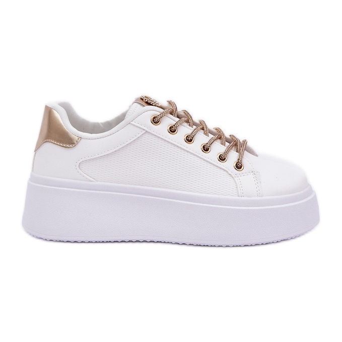 Sneaker su una piattaforma con lacci decorativi bianchi e oro bianca