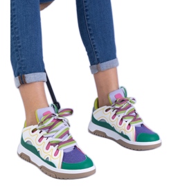 Sneaker da donna verde con allacciatura decorativa