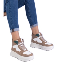 Sneaker sportive da donna beige sulla piattaforma