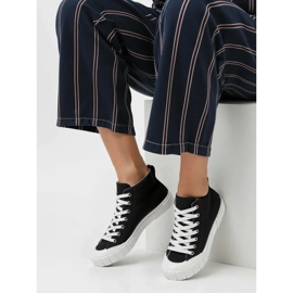 Sneaker nere arcuali da donna nero