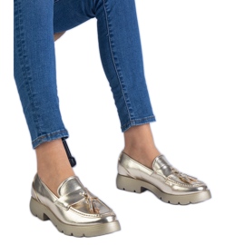 Scarpe classiche metalliche dorate con frange d'oro