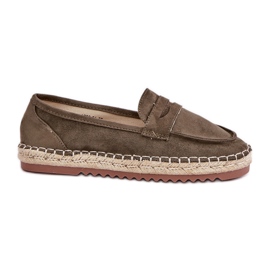 Espadrille da donna con una treccia di iuta su una piatta unica scura verde