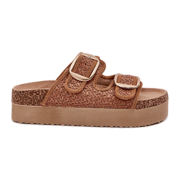 Pantofole con treccia e fibbie sull'enorme piattaforma di cammelli beige