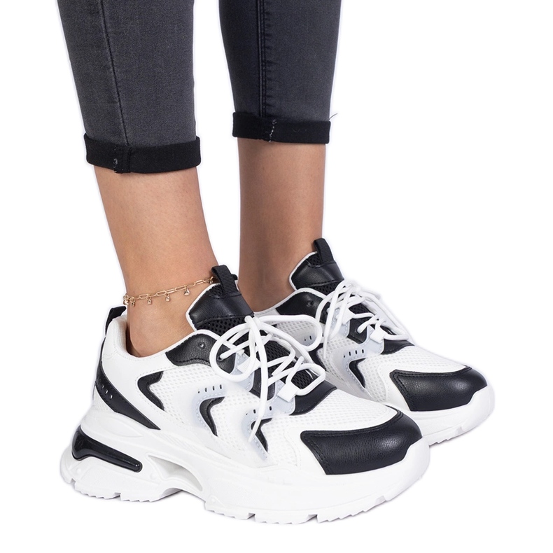 Sneaker sportivi da donna bianca e bianca nero