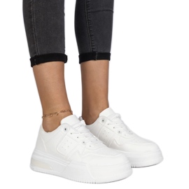 Sneakers bianche da donna con suola spessa bianca