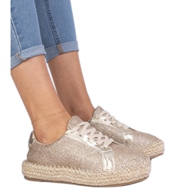 Espadrille da donne dorate decorate con glitter d'oro