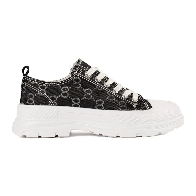 Sneaker nere sulla piattaforma con decorazioni nero