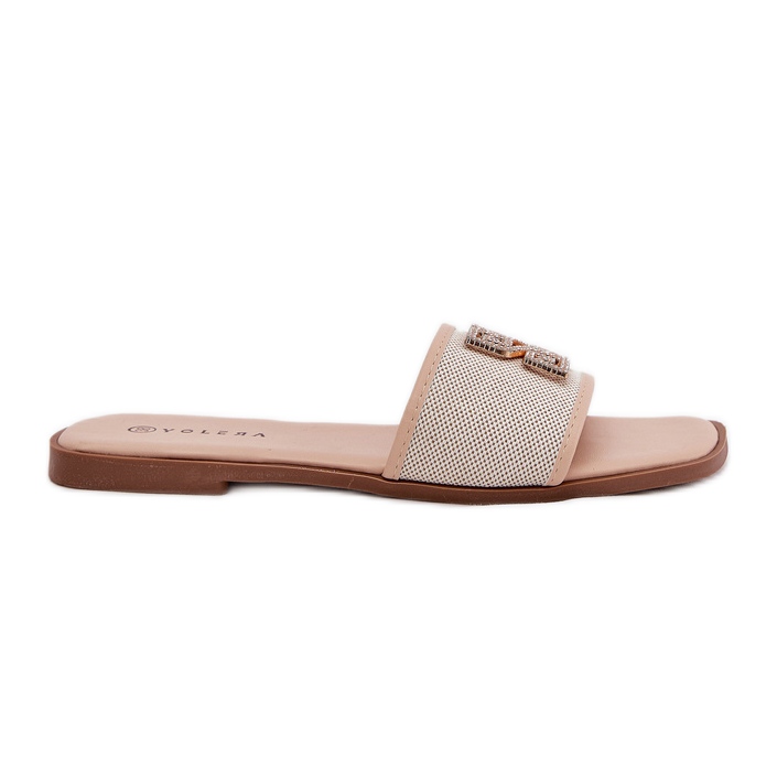 Eleganti infradito da donna con piatto -eed decorazione beige