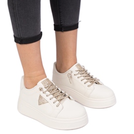 Sneaker beige con zirconi dorati