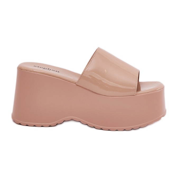 Pantofole per donne dipinte sulla piattaforma e zeppe beige