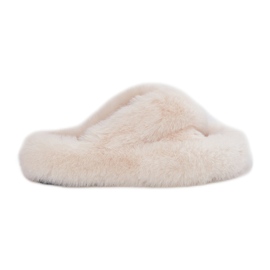 Pantofole di pelliccia da donna su una sola suola beige