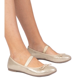 Golden Women's Ballerinas con un arco su una fascia elastica d'oro