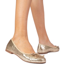 Ballerine glitter da donna dorata con un arco d'oro