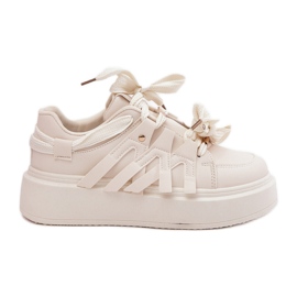 Sneaker in pelle ecologica sulla piattaforma beige