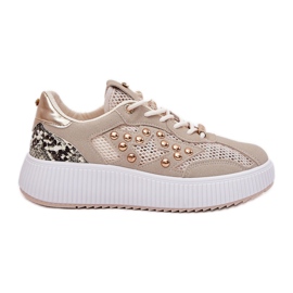 Scarpe sportive femminili con maglia e stalloni beige