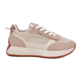 Scarpe sportive femminili con una mesh sulla piattaforma beige