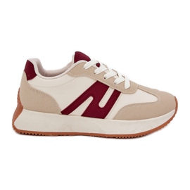 Scarpe sportive femminili sulla piattaforma beige blu