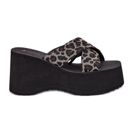 Infradito da donna su cuneo e piattaforma leopardo stampato nero beige