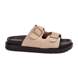 Infradito da donna sulla piattaforma con fibbie beige