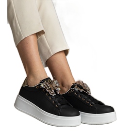 Sneaker nere decorate con una farfalla con zirconi nero