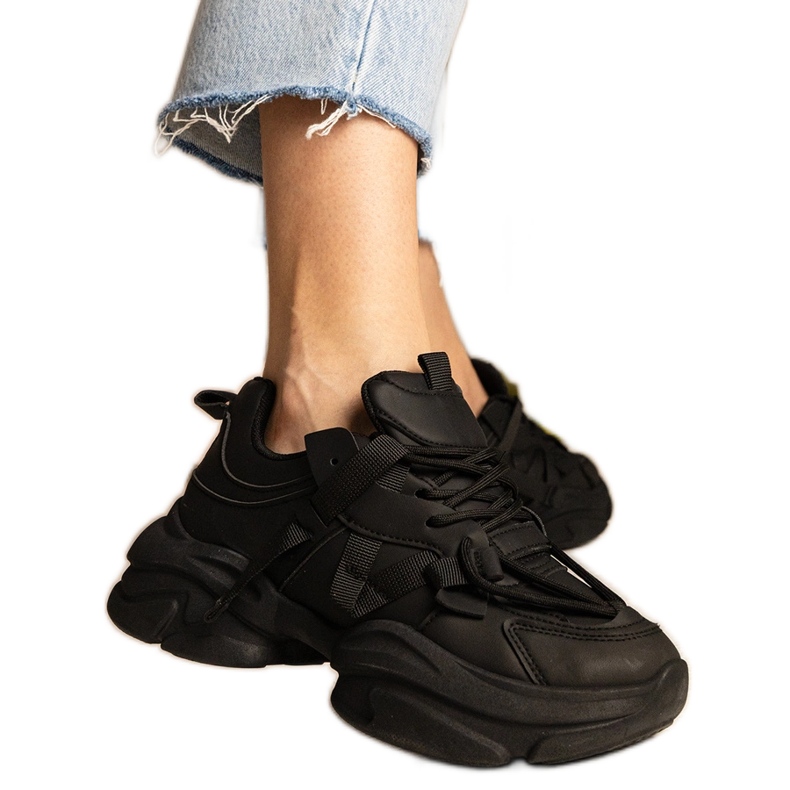 Sneaker nere le donne enormi delle donne nero