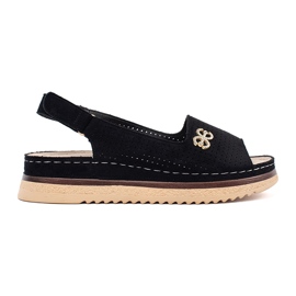 Goodin Openwork Sandals nero morbido con un ornamento