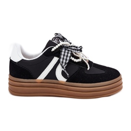 Sneaker femminili sulla piattaforma con decorazioni nere nero