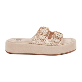 Infradito da donna sulla piattaforma con fibbie e treccia di beige