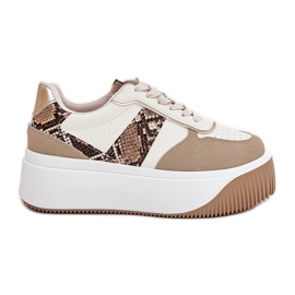 Sneaker femminili su una piattaforma enorme, beige del modello animale