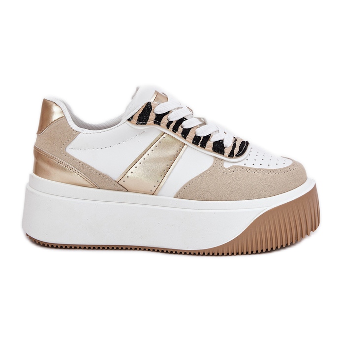 Sneaker da donna su una piattaforma enorme, modello di beige-o-oro