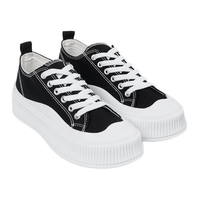 Sneakers bianche e nere con suola spessa nero